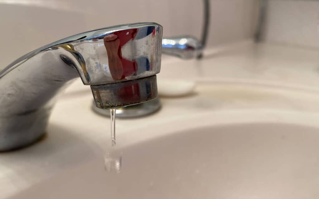 Memphis homeowner using the Drip and Trickle method to prevent frozen pipes.